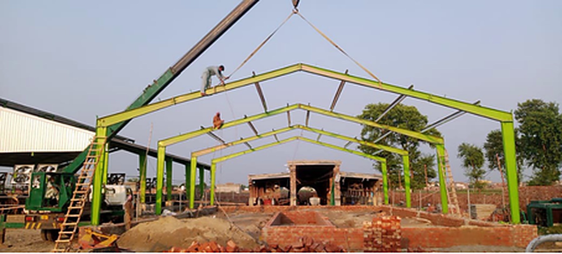 Steel roof trusses being erected