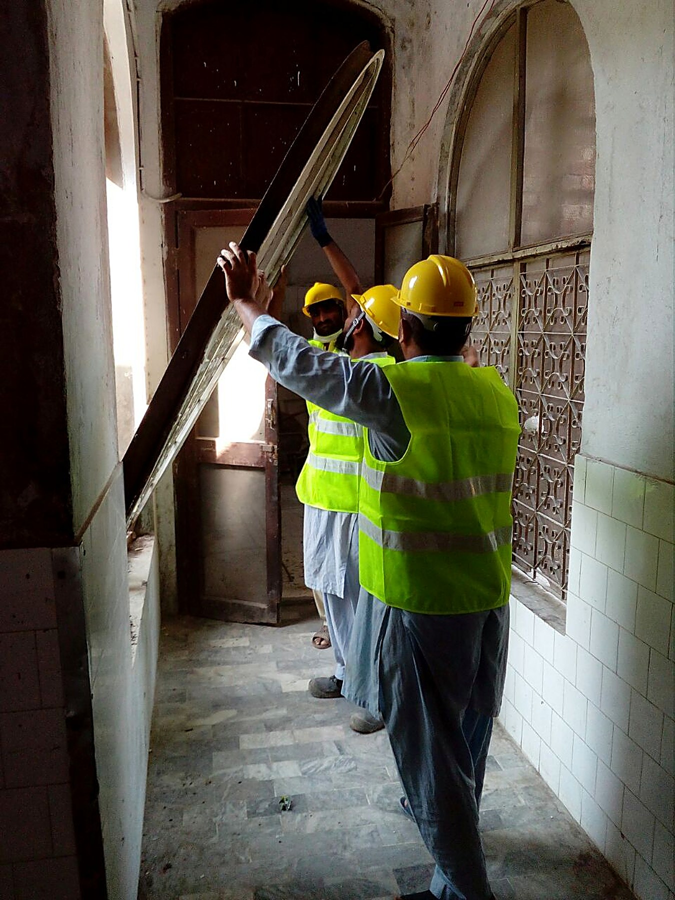Installing timber windows at Mayo Hospital