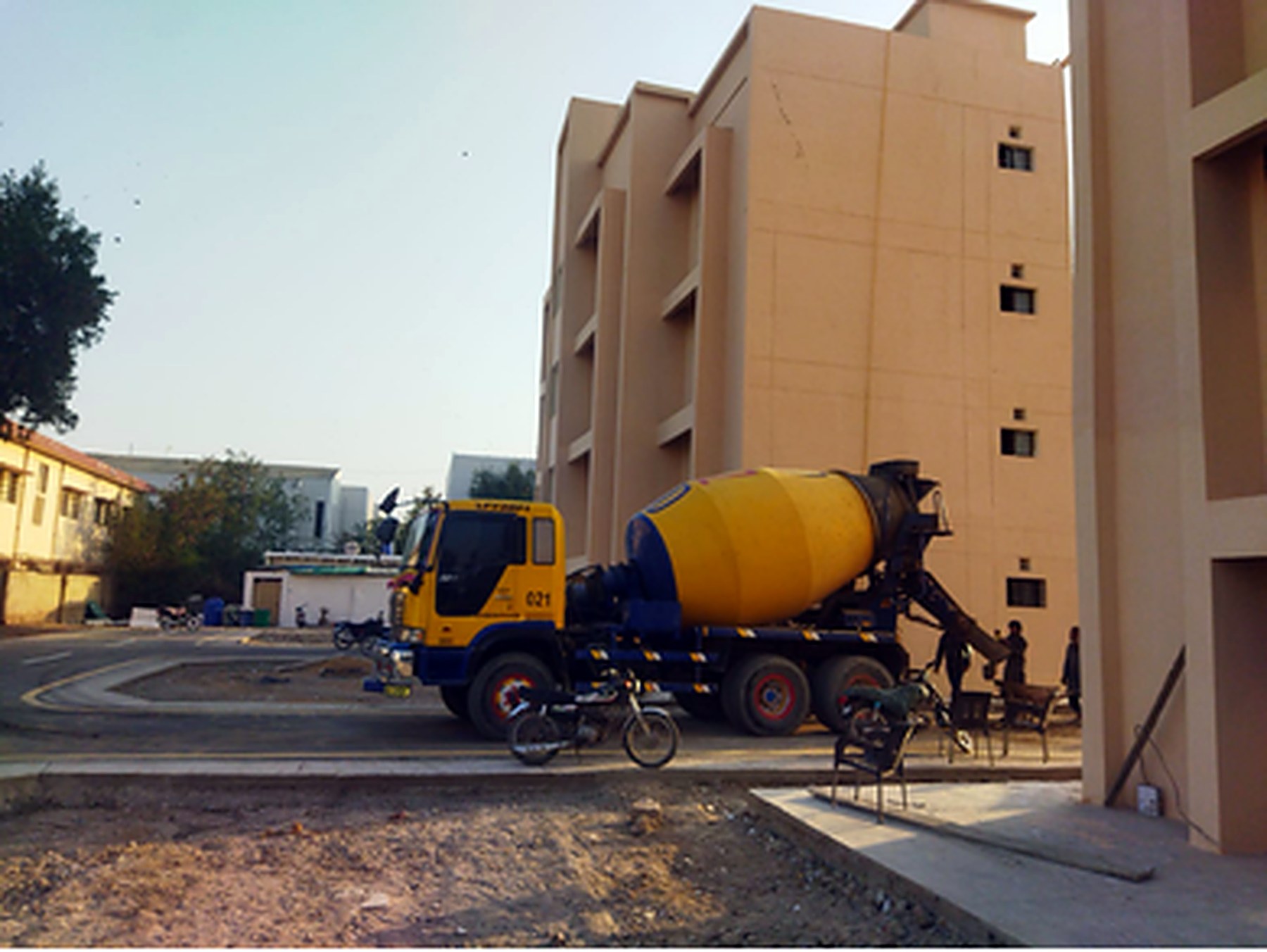 Transit mixer delivering concrete